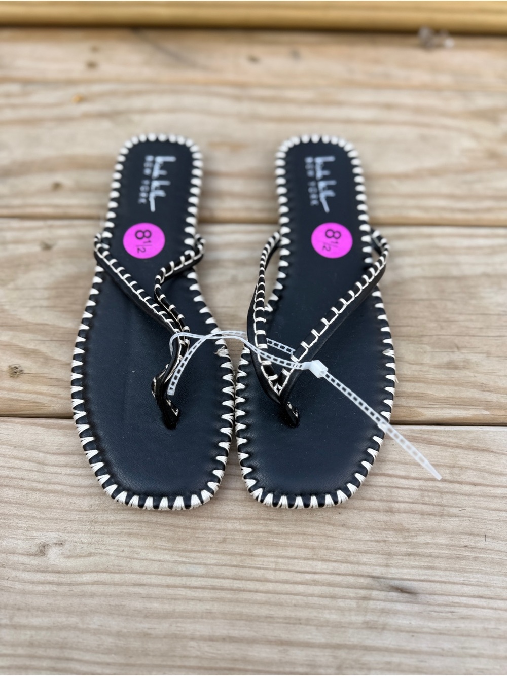 Nicole Miller Black Flip Flops with White Whipstitch Trim NWOT - Picture 2 of 4